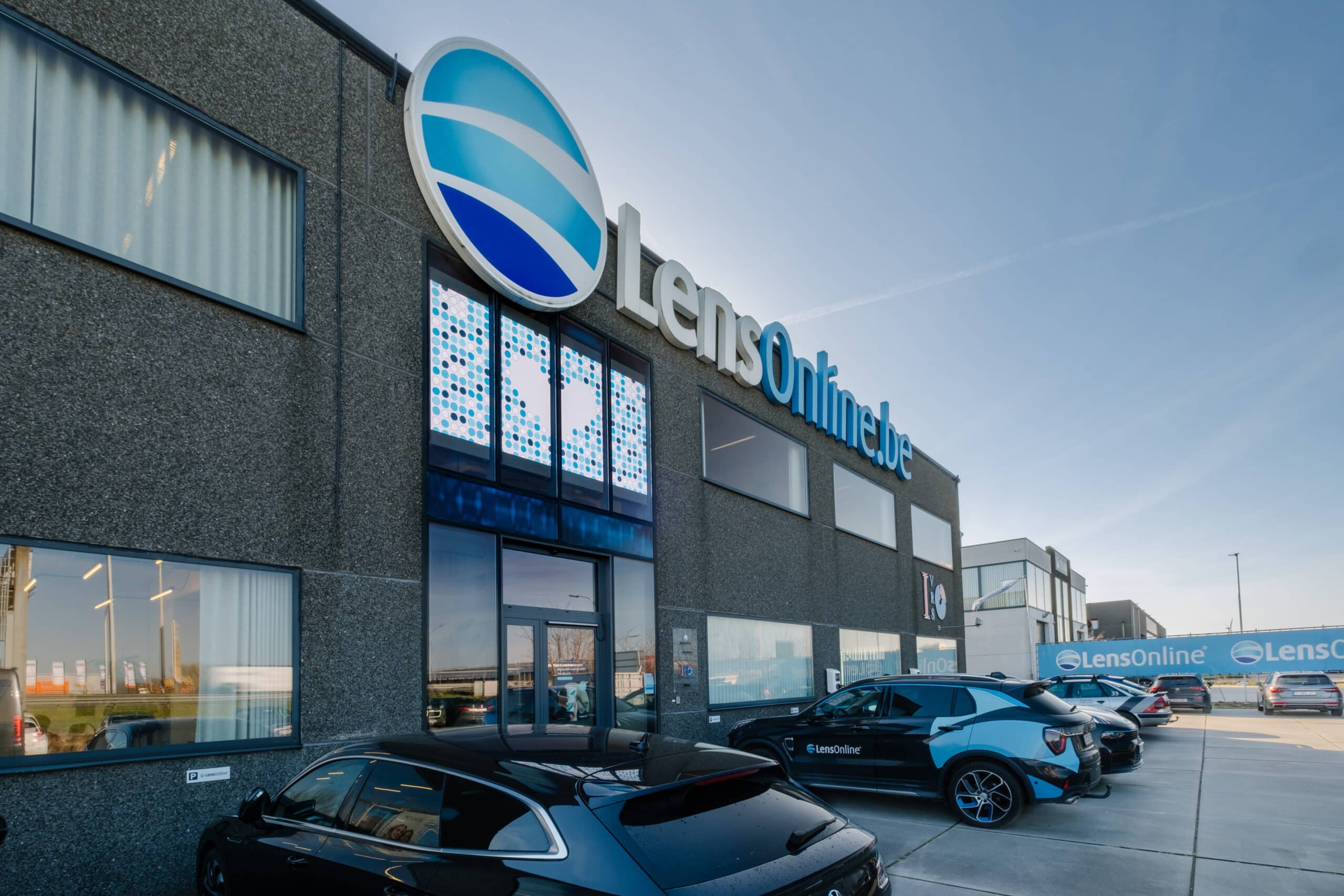 Brightboard LED screen in store window of LensOnline.